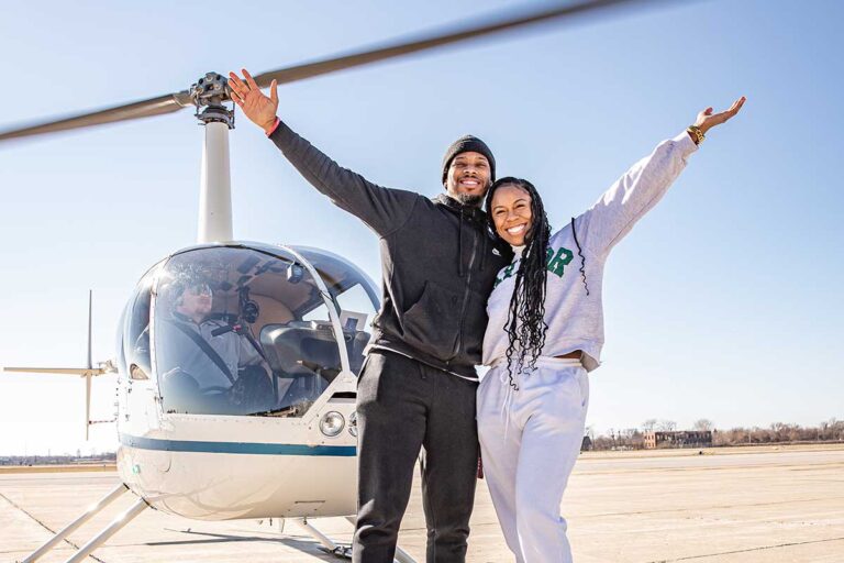 Couple after a helicopter ride