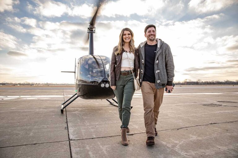 Couple after a helicopter ride