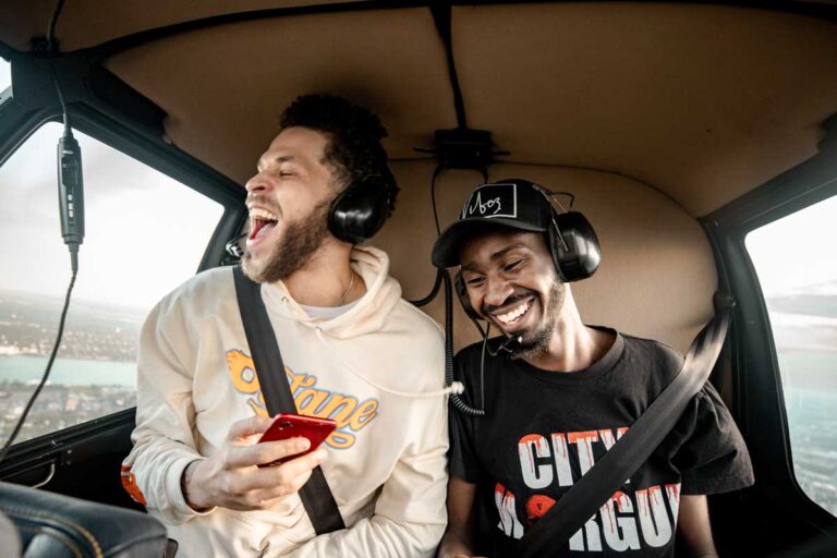 Men enjoying a ride on a helicopter in Detroit