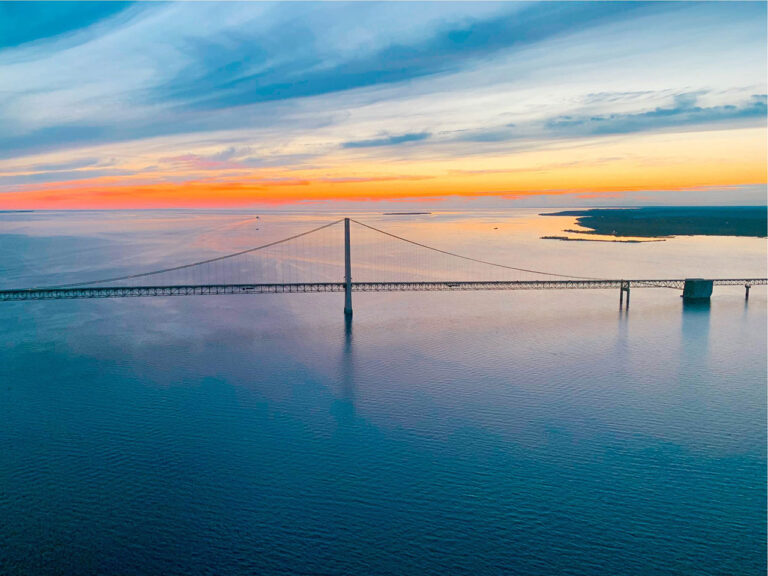 St Ignace bridge at sunset from helicopter