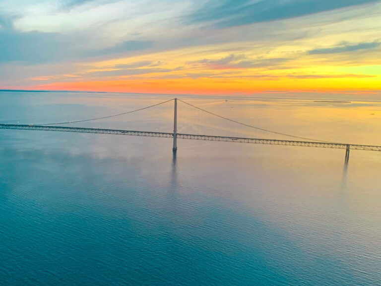 St Ignace bridge at sunset from helicopter