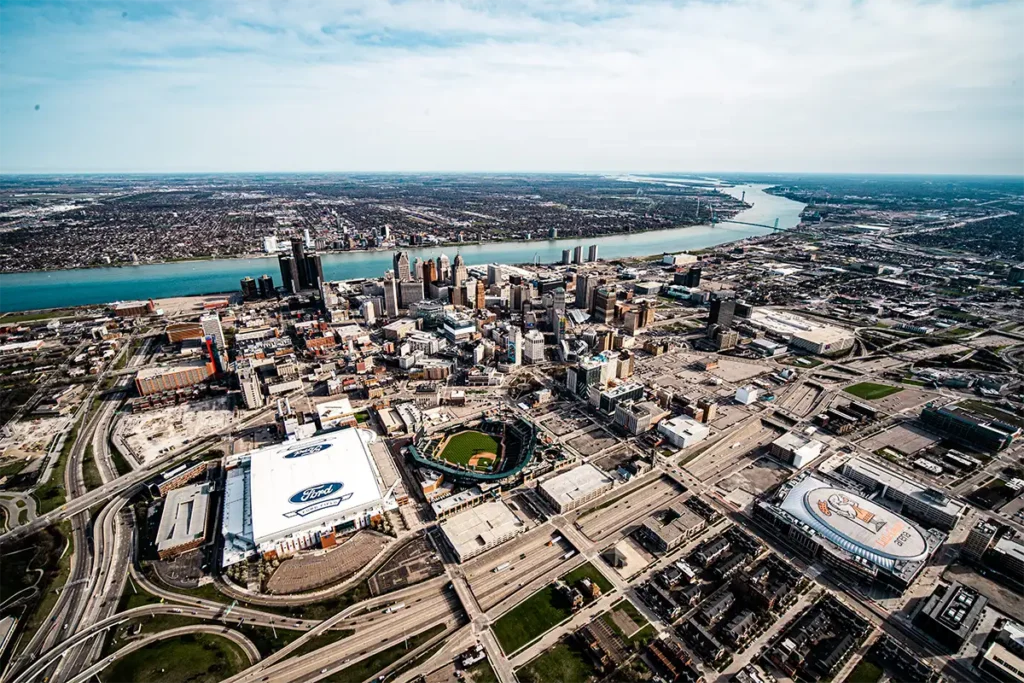 a landscape view of downtown detroit and the surrounding area from a helicopter tour