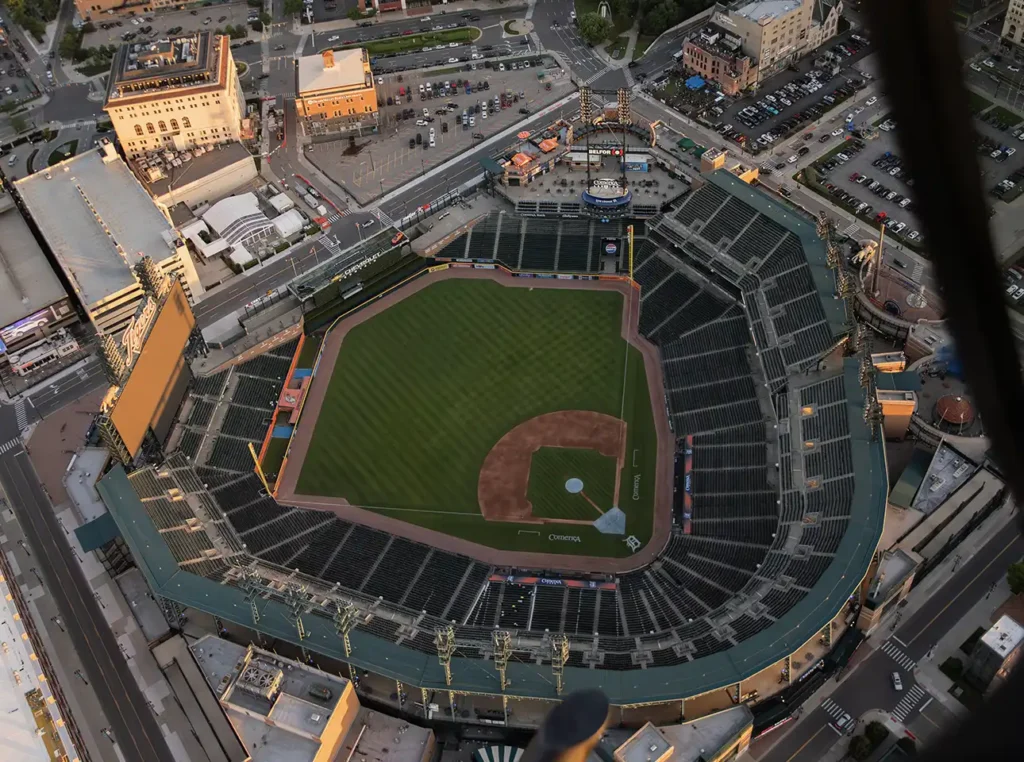 a top down sunset view of comerica park during a helicopter tour