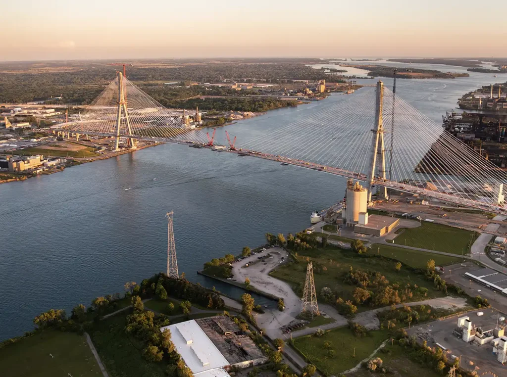 the gordie howe bridge during sunset as taken from a helicopter
