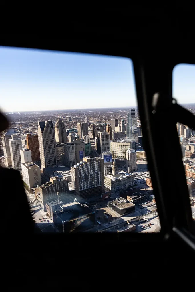 a view of downtown detroit from inside a helicopter