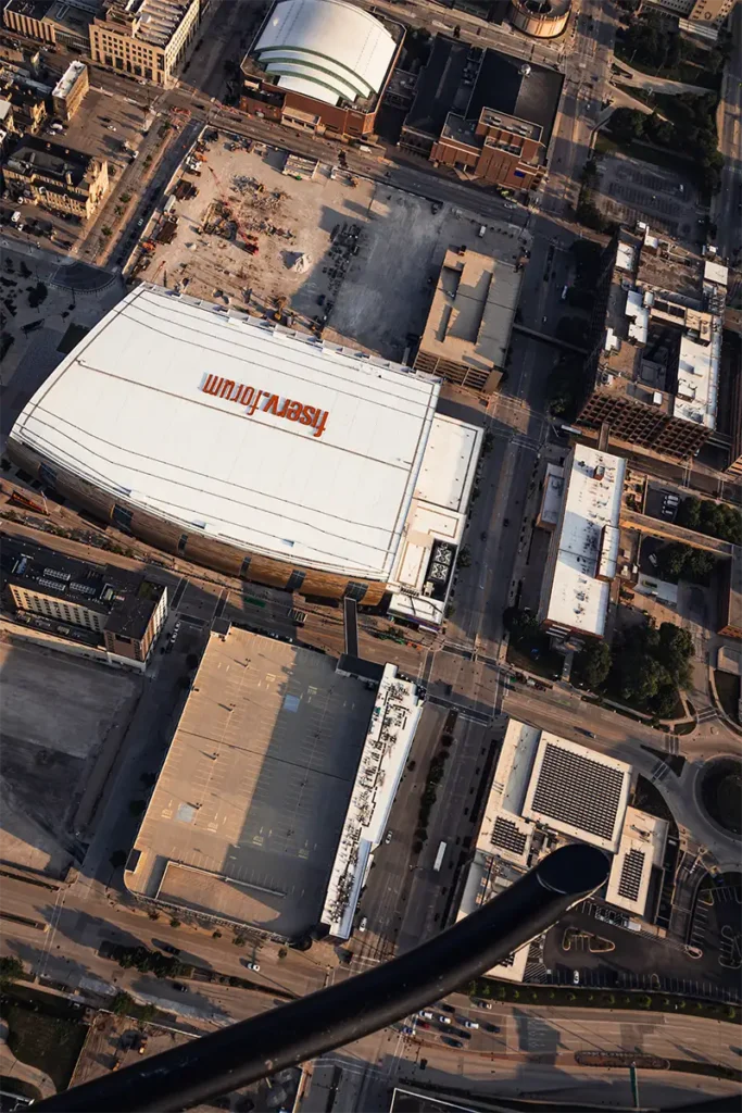 fiserv forum in milwaukee viewed from a helicopter directly above (top-down)