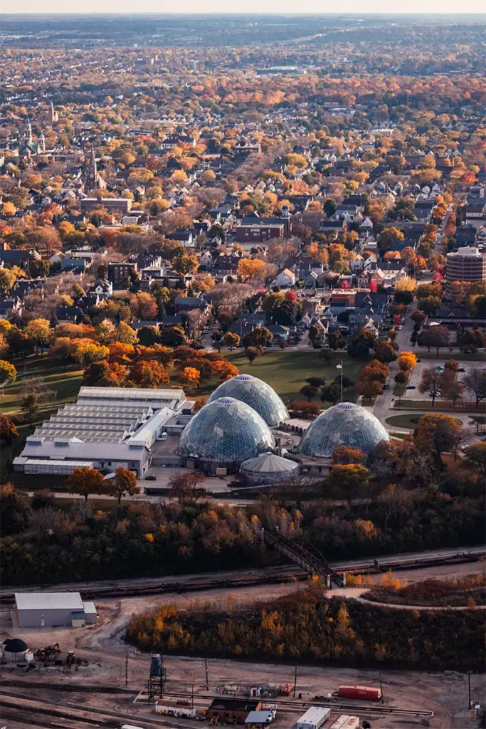 milwaukee mitchell park domes viewed from a helicopter at sunset