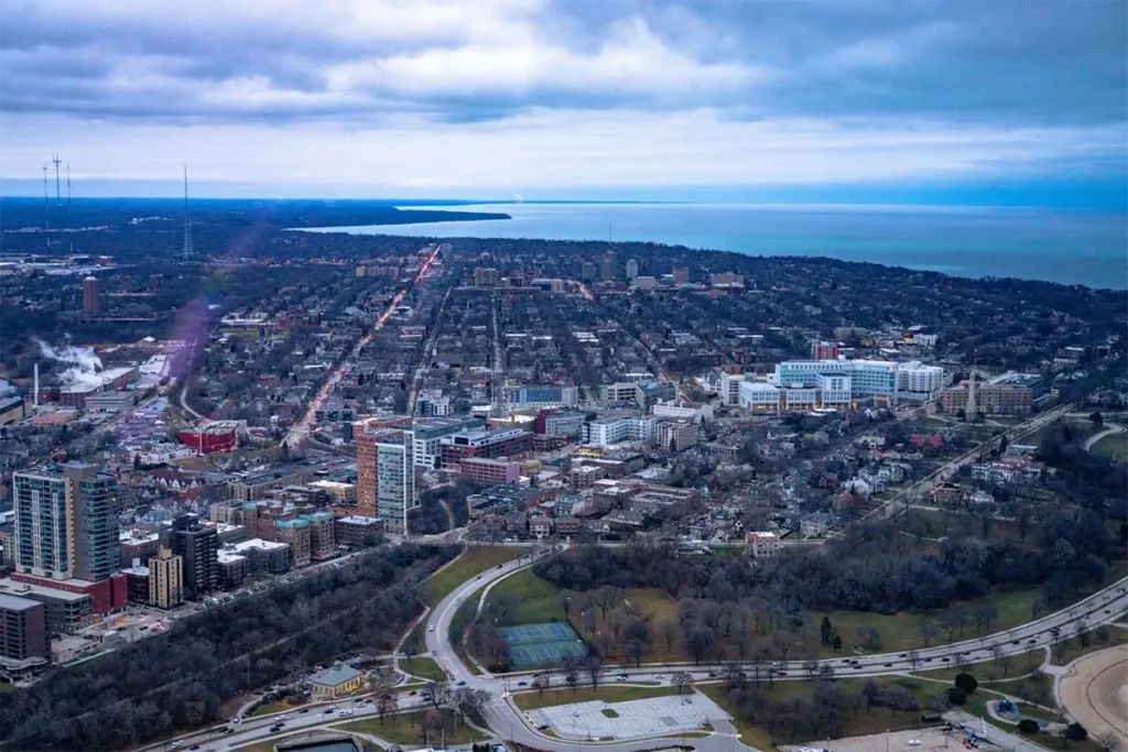 a view of downtown milwaukee from a helicopter on an overcast day