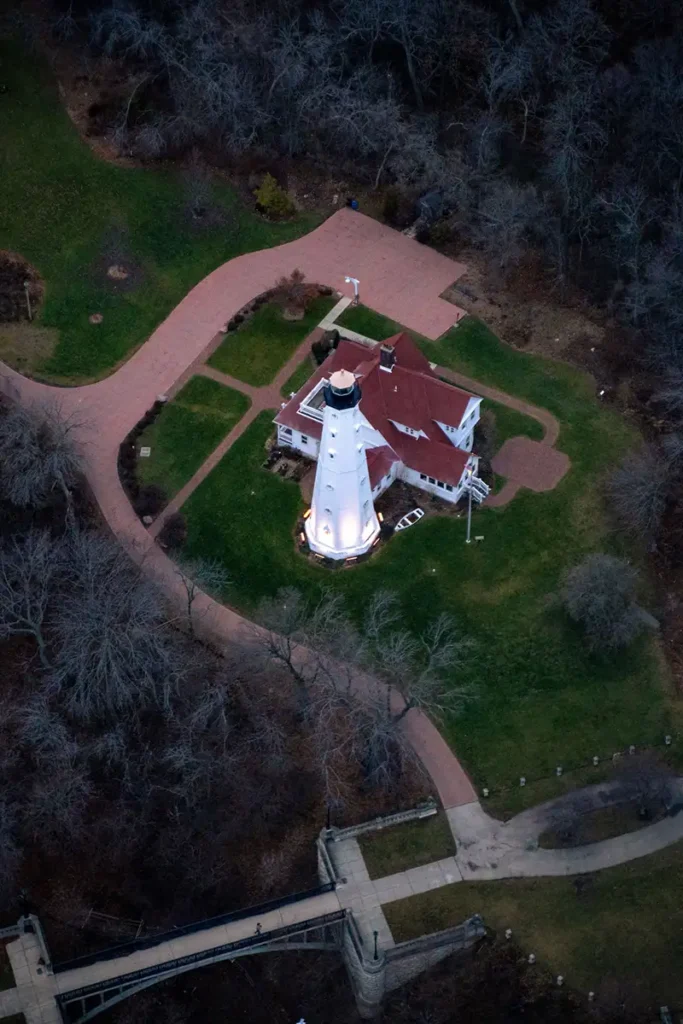 a lighthouse in milwaukee from a helicopter