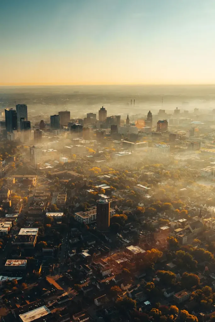 downtown milwaukee captured from a helicopter with some low fog